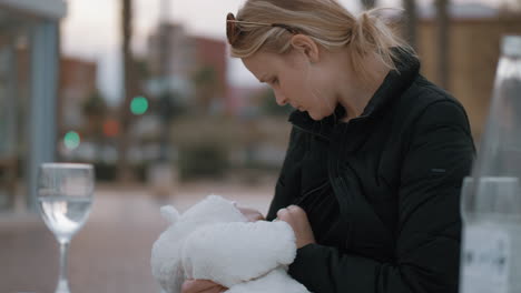 Mother-breastfeeding-her-baby-girl-outside