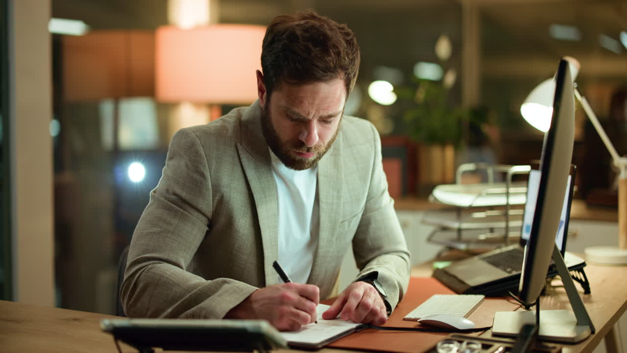 Man working at desk with computer