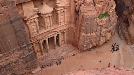 view from above, stunning view of al-khazneh (the treasury) one of the most elaborate temples in petra, a city of the nabatean kingdom, jordan