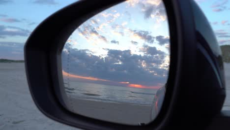 sunset view on car mirror