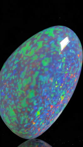 close-up of a vibrant opal gemstone with colorful reflections