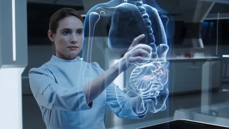 woman interacting with holographic human anatomy display