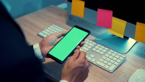 business man use smart phone green screen