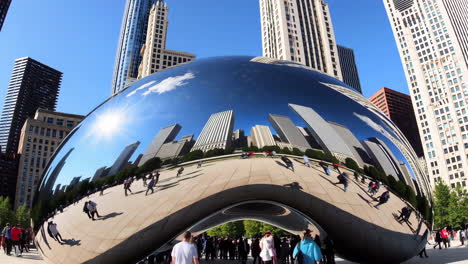 cloud gate (the bean) sculpture and reflections in chicago's millennium park