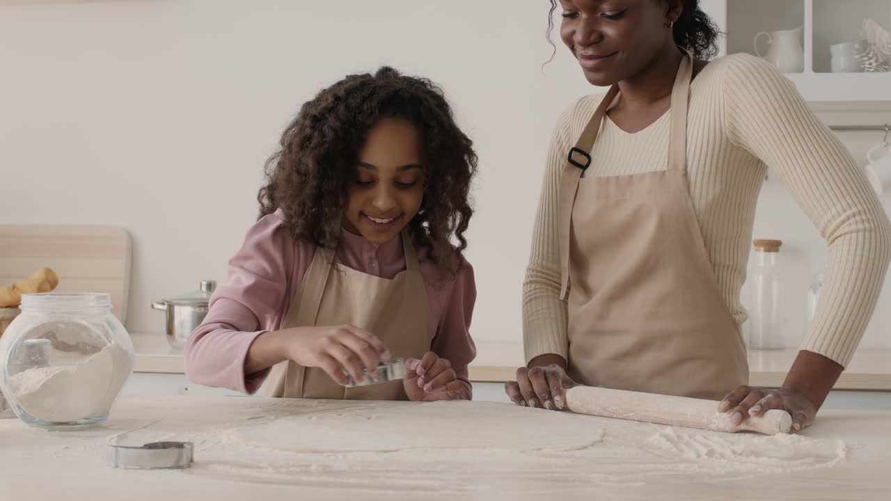 Mother and Daughter Baking Together