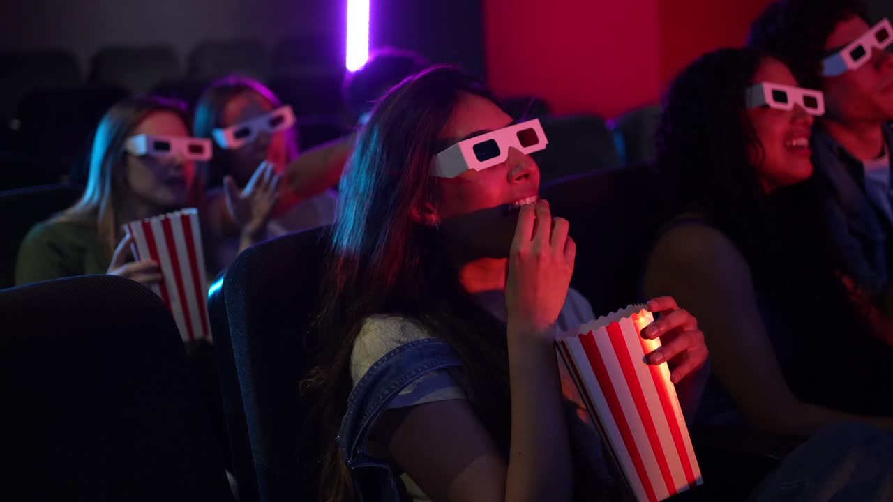 People watching a 3D movie in a cinema