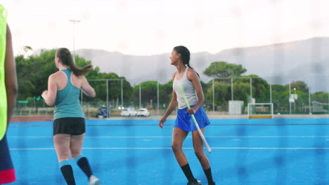 sports team celebrating teamwork with a high five