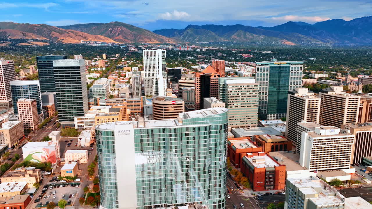 Salt Lake City USA, 1 August 2025: Salt Lake City downtown aerial with modern high rises. Panoramic aerial view of Salt Lake City downtown with tall buildings and mountain backdrop