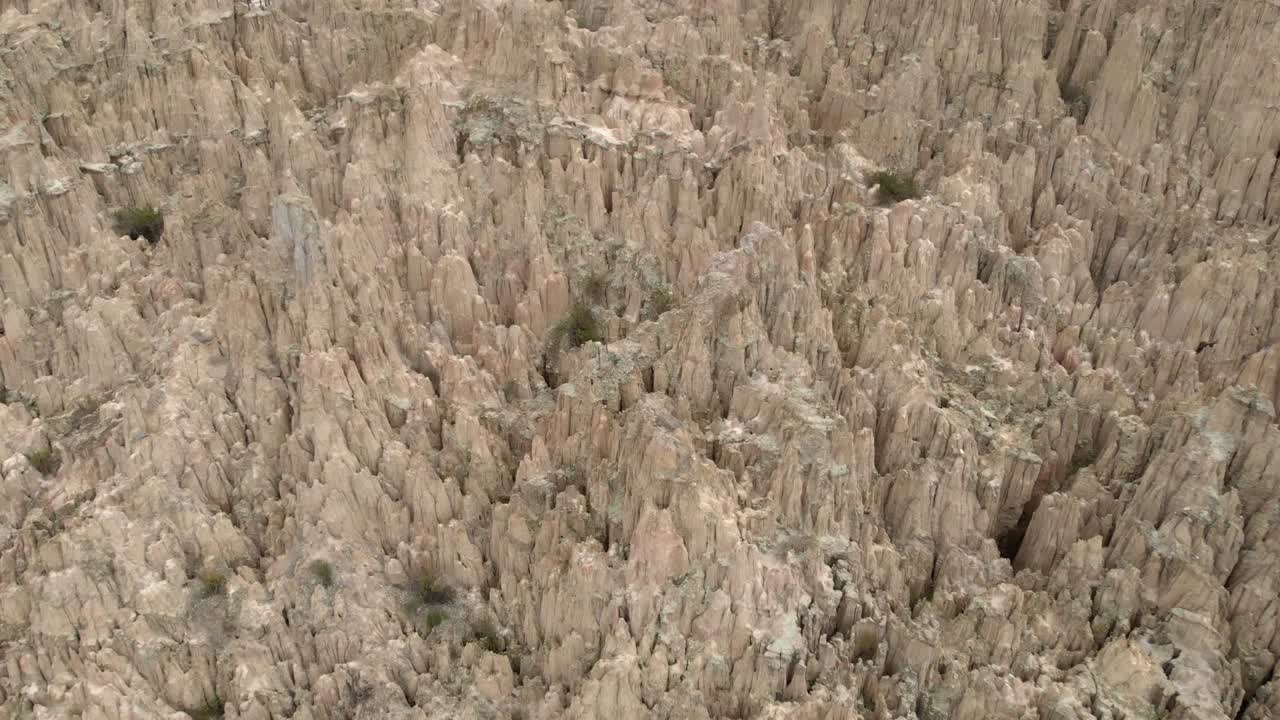 Dramatic aerial view of erosion hoodoo formations in La Paz, Bolivia