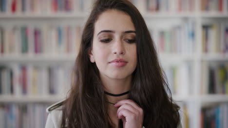 portrait beautiful young woman student preparing for interview meeting smiling happy teenage girl library bookstore background