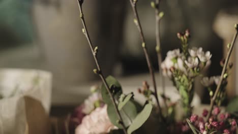 closeup of colourful flower arrangements in a florist workshop.