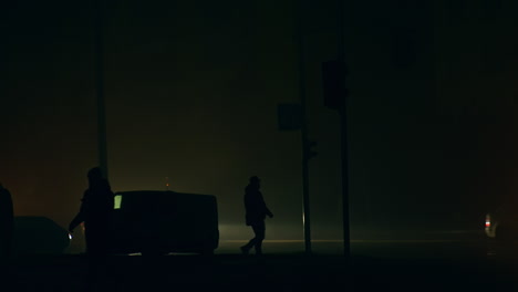 foggy night city street scene