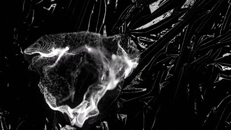 animation grey ring of smoke over light on moving shiny black plastic