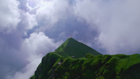 nepal jesus christ cross christian in green hills clouds, adventurous, blue sky, buddhist flags, hills, landscape, travel, tourism, drone shot 4k