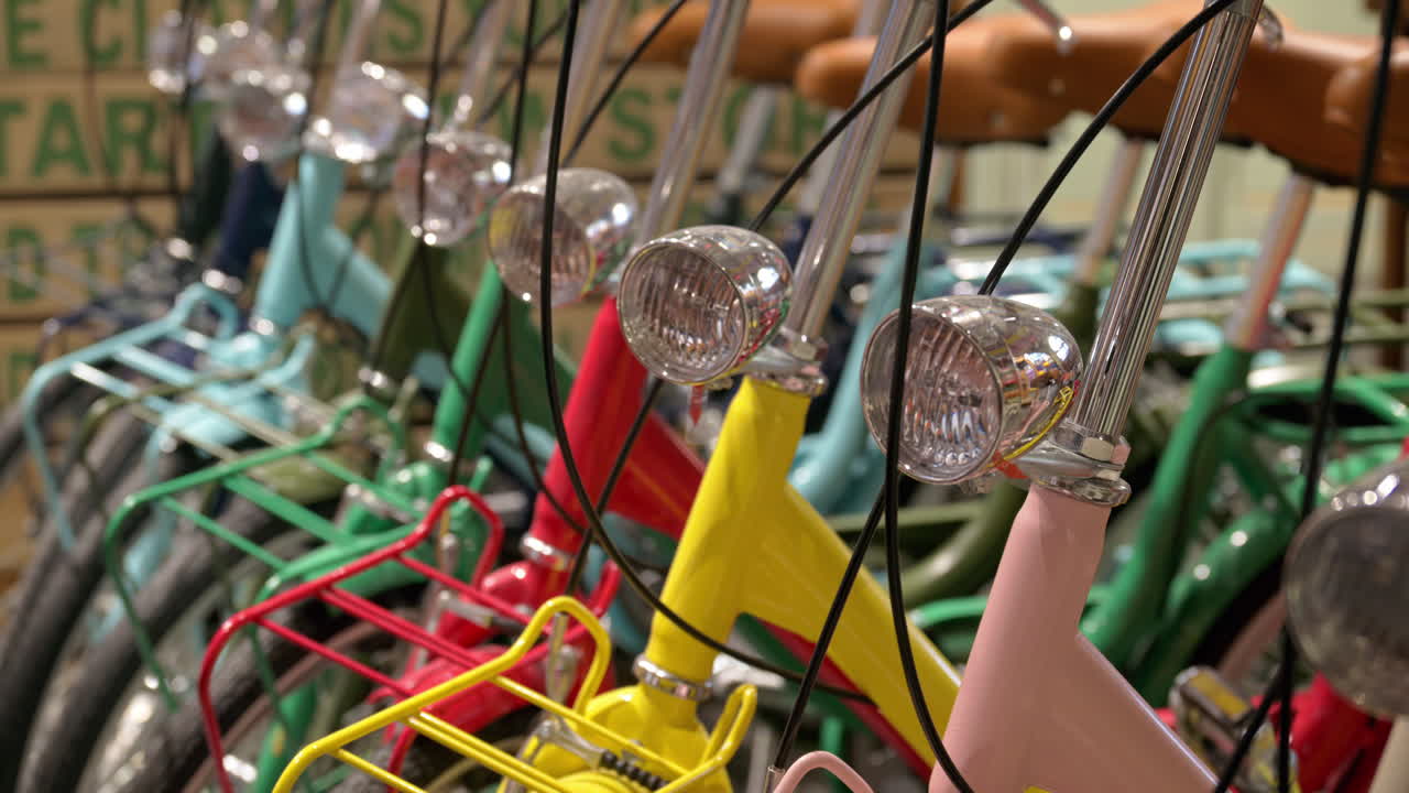 Close up of colourful bicycles parked in a store
