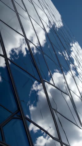 modern building facade with cloud reflections
