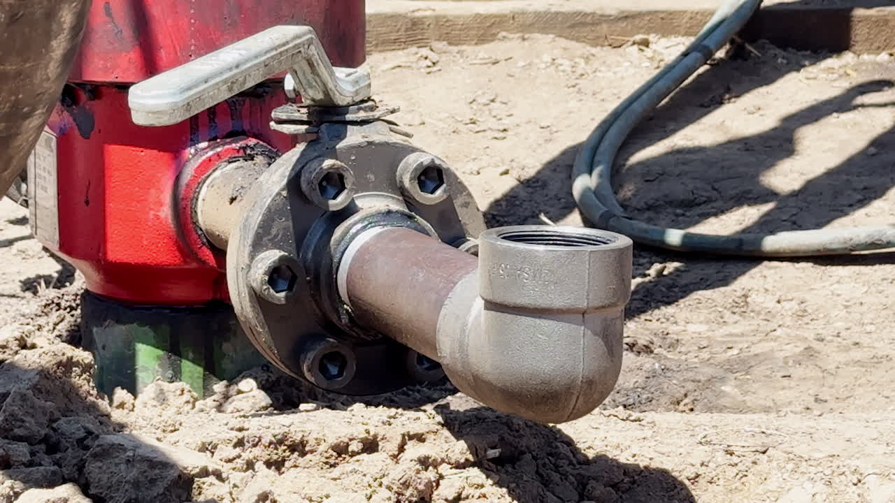 Gas goes up from the wide metal pipe. Close up. Production of natural resources. Business concept.