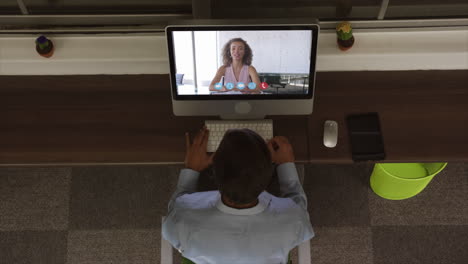 overhead view of man having a video conference