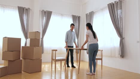 young happy couple moving in new home