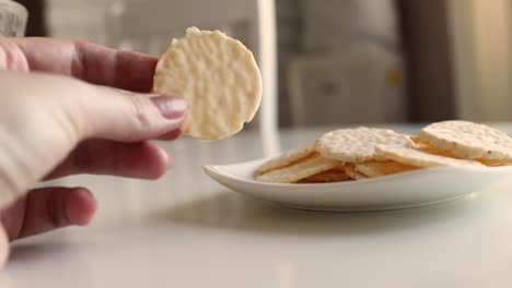 round cookies in white chocolate on a white table. sweet morning.