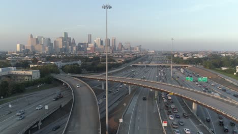 aerial view over traffic on freeway near downtown houston