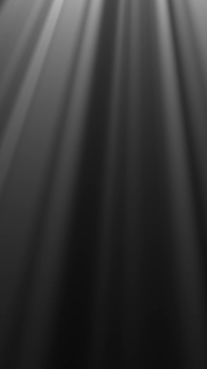 Cinematic Light Rays Moving Downwards on a Dark Background