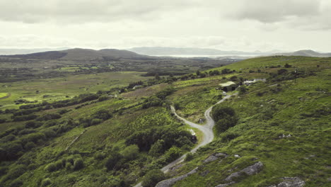 beautiful ireland aerial of highlands with grass covered