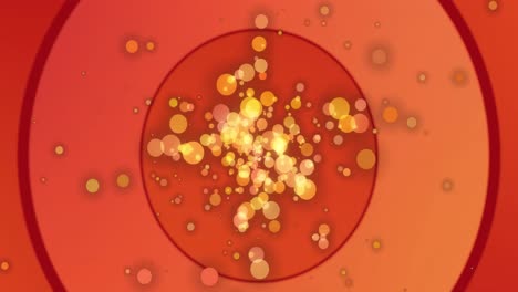 Animation-of-yellow-and-orange-bokeh-circles-of-light-floating-on-red-and-orange-circles