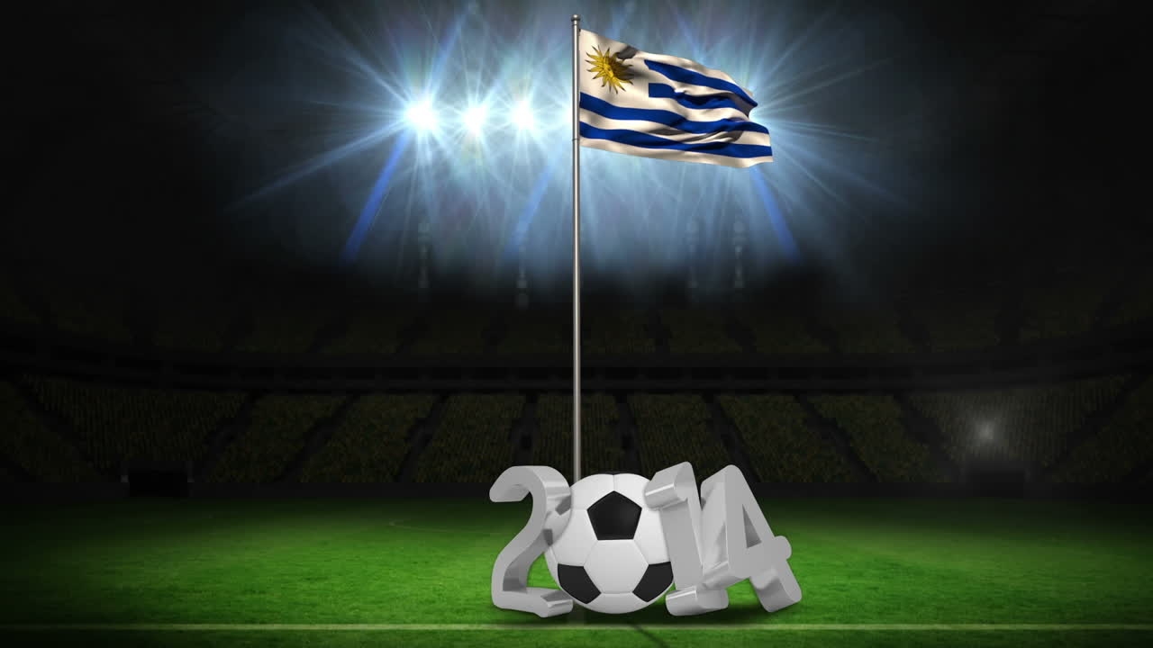 우루과이 국기가 2014년 메시지와 함께 발 기둥에서 흔들리고 있다.