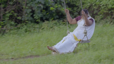 onam traditional swing in kerala called oonjal attam is traditional family entertainment during onam celebration