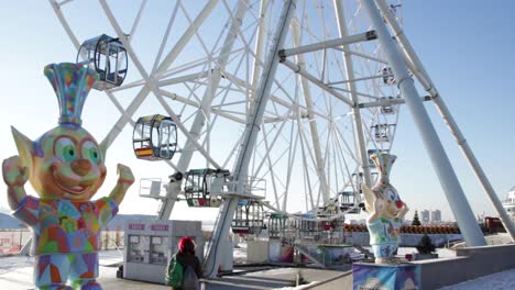 white ferris wheel against a clear blue sky