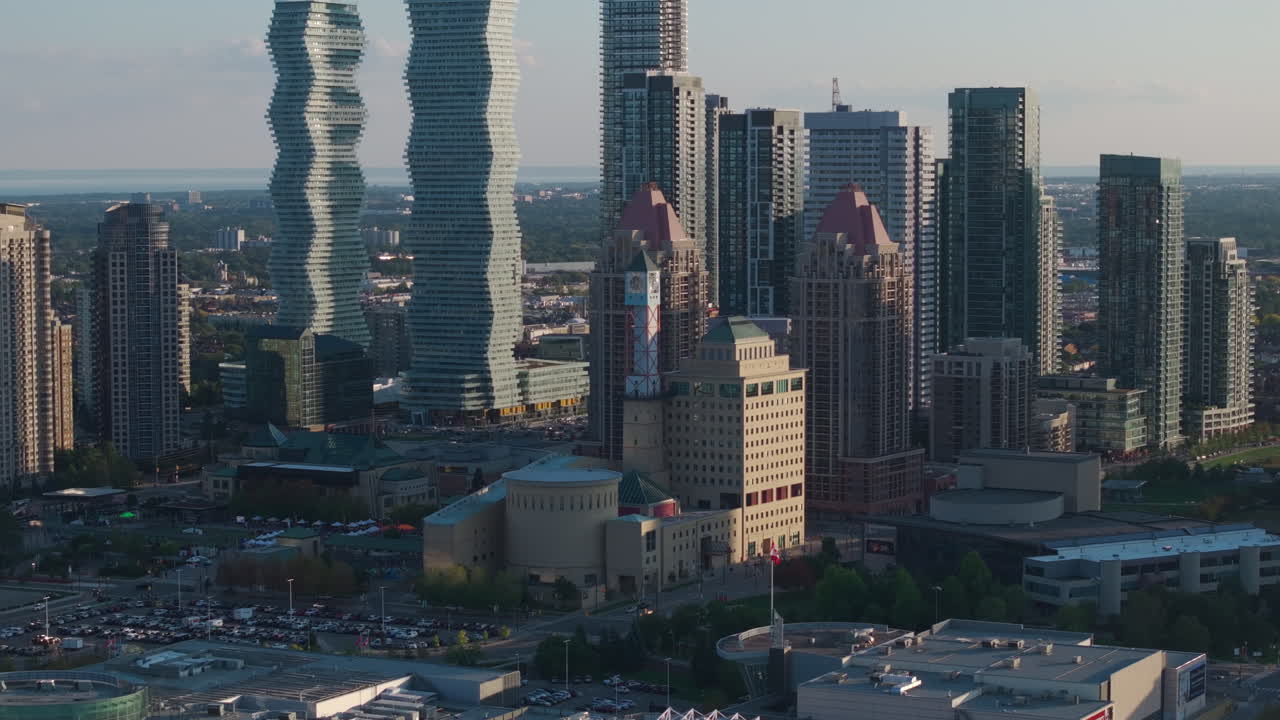 Cityscape of Mississauga at dusk, showcasing Square One, City Hall