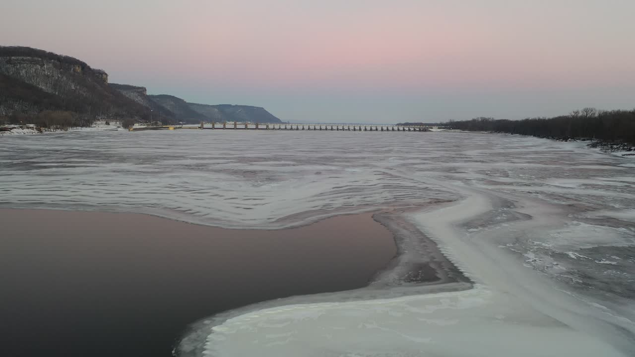 Frozen River with Dam at Sunrise/Sunset