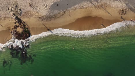 aerial view of chahue bay with its golden sand and emerald green waters