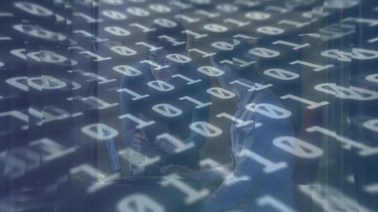 Binary digits flowing initiating tech analysis as woman typing laptop and man pointing screen