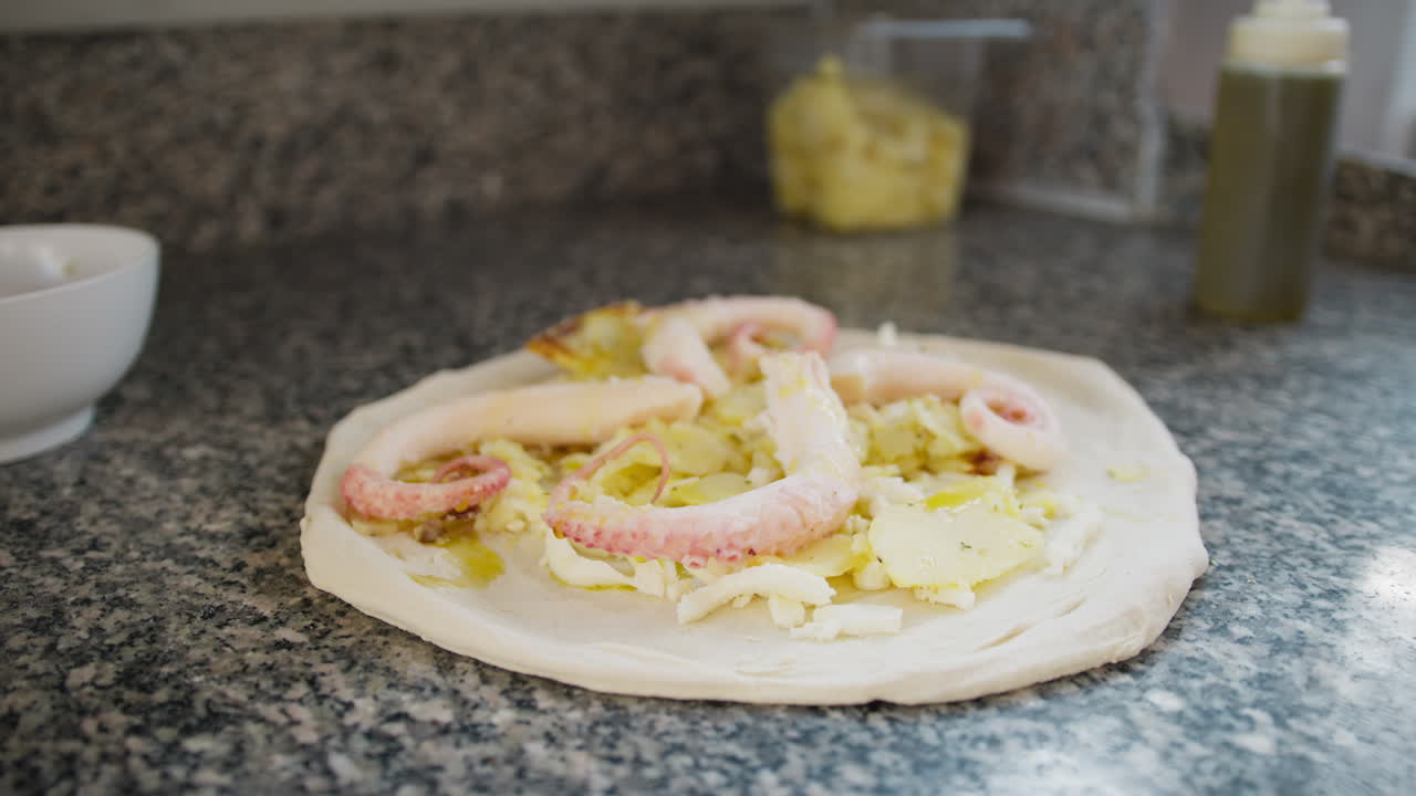 Raw Pizza With Potatoes And Octopus Ready To Go In The Oven