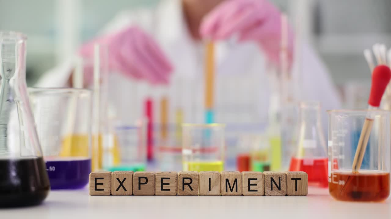 Experiment in a laboratory with beakers and chemicals