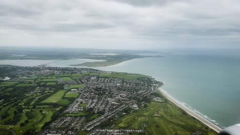 plane landing in dublin airport on cloudy day