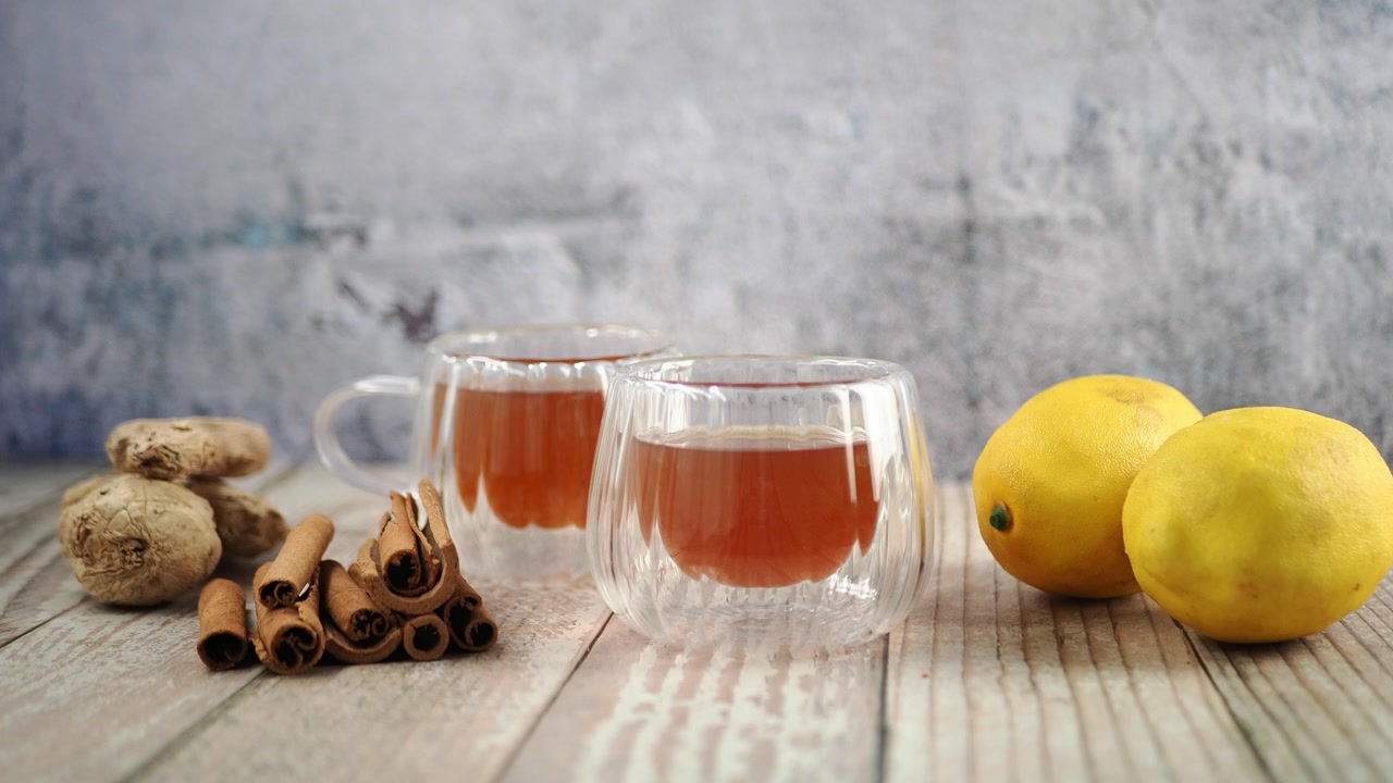 Herbal Tea with Ginger, Cinnamon Sticks, and Fresh Lemons