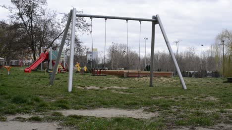 Empty blaocked children playground in residential area during quarantine for covid in europe