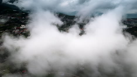 aerial hyperlapse in patchy clouds above scenic sapa in northern vietnam