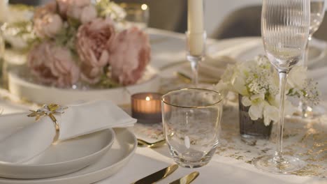 close up of table set for meal at wedding reception 1