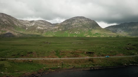 Connemara-Landscape-Mountains-Aerial-Car-Profile-Follow