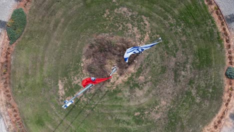 4K-high-resolution-aerial-drone-video-view-of-the-flower-highway-interchange-with-Israeli-flags--Rishon-Lezion--Israel