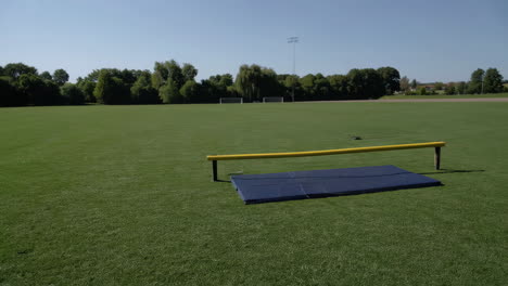 empty track and field with jump mat