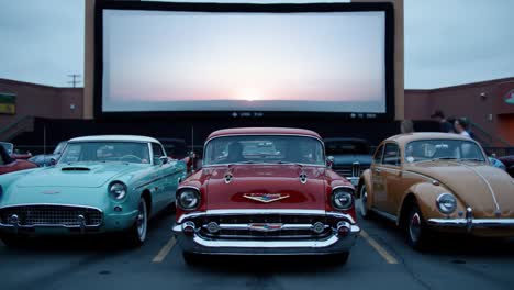 an enchanting evening at the drive-in theater: classic cars showcase under the twilight sky