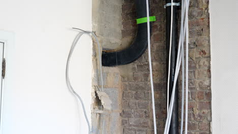 plumbing installation with flexible duct pipe inside an under construction building