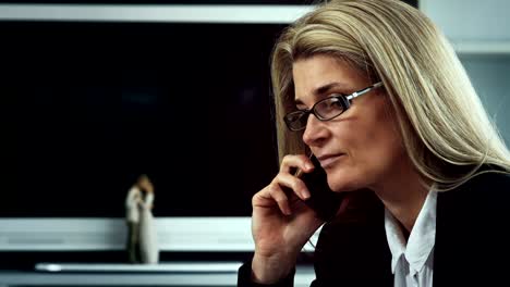 business woman talking on the phone close up