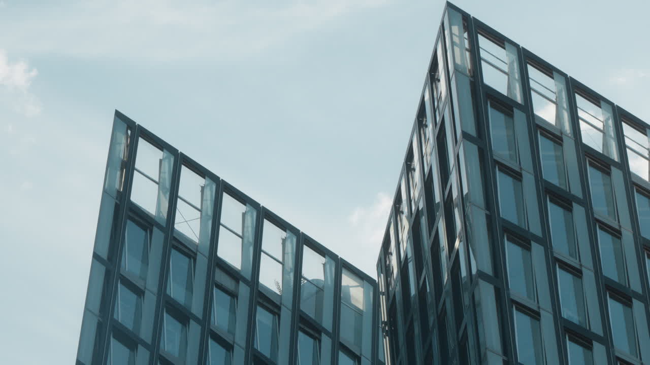Close-Up of Tanzende Türme. Modern glass building with geometric design in Hamburg. Perfect for corporate presentations or architectural showcases