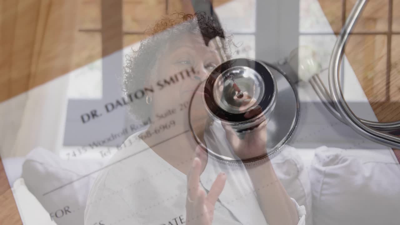 Animation of stethoscope and doctor's certificate over senior woman talking on smartphone